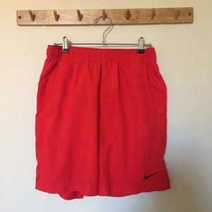 Red Nike shorts